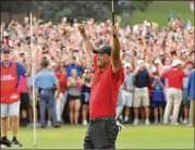  ?? HYOSUB SHIN / HSHIN@AJC.COM ?? “It gives me chills almost every single time I see it,” says Tiger Woods of the crowd on the 18th green at the Tour Championsh­ip last year.