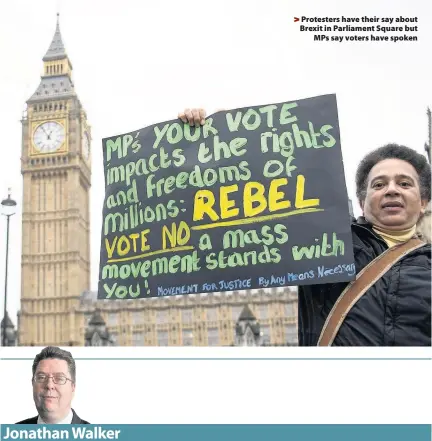  ??  ?? > Protesters have their say about Brexit in Parliament Square but MPs say voters have spoken