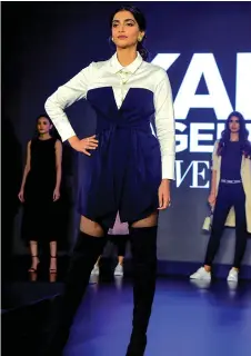  ?? Photo — AFP ?? In this file shows Bollywood actress Sonam Kapoor Ahuja stands on the stage during the launch of capsule collection of Karl Lagerfeld in Mumbai.