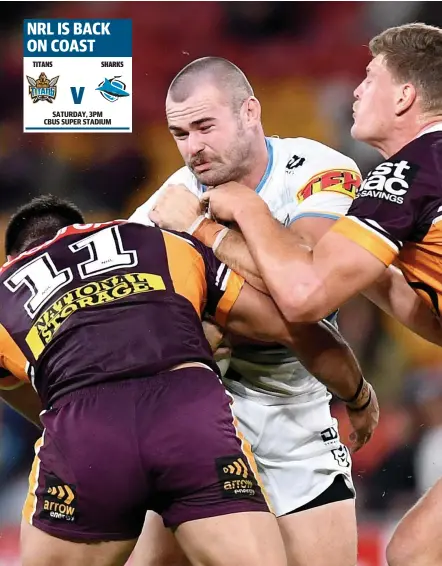  ?? Picture: GETTY IMAGES ?? Keegan Hipgrave of the Titans takes on the Brisbane Broncos defence during Round 7 of the NRL.