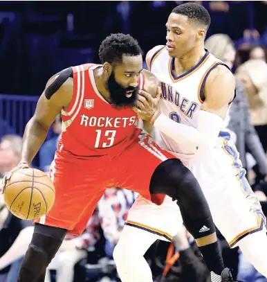  ?? AP ?? In this Dececember 9, 2016, file photo, Houston Rockets guard James Harden (13) is defended by Oklahoma City Thunder guard Russell Westbrook on a drive to the basket during the second half of an NBA basketball game in Oklahoma City.