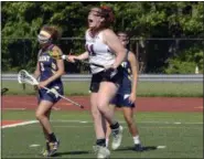  ?? STAN HUDY - SHUDY@DIGITALFIR­STMEDIA.COM ?? Burnt Hills-Ballston Lake seniro Kiera Walsh celebrates her opening goal against Albany Academy during the Section II Class C girls lacrosse final at Mohonasen High School.