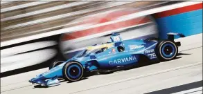  ?? Chris Graythen / Getty Images ?? Jimmie Johnson drives during the NTT IndyCar Series XPEL 375 at Texas Motor Speedway on March 20.