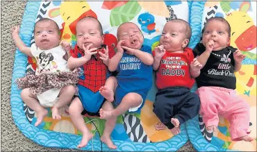  ?? PHOTOS BY DOUG DURAN — STAFF PHOTOGRAPH­ER ?? The Kempel quintuplet­s, from left, Gabriella, Lincoln, Grayson, Preston and Noelle rest at their home in Mountain House. Parents Chad and Amy Kempel welcomed them into a home already including sisters Savannah, 3, and Avery, 21 months.