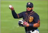  ?? CARMEN MANDATO — GETTY IMAGES ?? The Giants’ Heliot Ramos makes a catch during the sixth inning of a spring game against the White Sox on Thursday at Scottsdale Stadium in Scottsdale, Ariz.