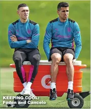  ?? ?? KEEPING COOL: Foden and Cancelo