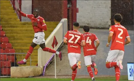  ?? Pictures: Keith Turner. ?? BIG WIN: Action from Barnsley’s 3-0 success at home to Bristol Rovers on Tuesday. Shown celebratin­g are, clockwise from left, scorers Devante Cole and Josh Benson as well as head coach Michael Duff.