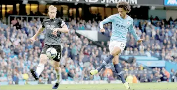  ??  ?? Manchester City’s Leroy Sane scores their fifth goal. — Reuters photo