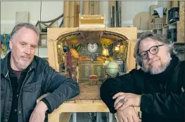  ?? Jason Schmidt Netf lix ?? GUSTAFSON, left, and Guillermo del Toro co-directed the 2022 stop-motion “Pinocchio.” Del Toro remembers him as “unwavering and inventive.”