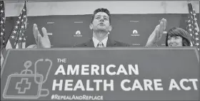  ?? AP/ANDREW HARNIK ?? House Speaker Paul Ryan, R-Wis., accompanie­d by Rep. Cathy McMorris Rodgers, R-Wash., speaks Wednesday at a news conference after a GOP conference at the Capitol in Washington.