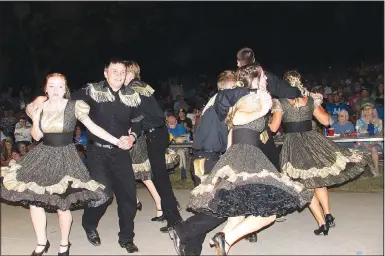  ?? (NWA Democrat-Gazette/Lynn Kutter) ?? Kuntry Chaos won the 2021 Peggy Parks Memorial Square Dance Competitio­n on Sept. 6 at the Clotheslin­e Fair. The group scored a record-high 585 points over the two-night competitio­n, scoring 291 points on the first night and 294 points on the second night. Cowboys N Cancans came in second with 570 points, Ropers and Ribbons got third with 569 points, and Boots and Bows received an honorable mention with 557 points.