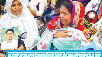  ?? — AFP ?? DHAKA: Bangladesh­i relatives hold photos of disappeare­d persons during a press meeting in Dhaka. Hundreds of relatives of people who went missing in Bangladesh in the last few years join a protest, demanding justice for the victims. Rights groups said hundreds of people have allegedly been abducted by security forces as part of a crackdown on proopposit­ion activists.