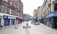  ??  ?? Deserted Port Street the morning after the first lockdown was announced last March