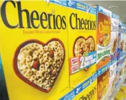  ?? Danny Johnston / Associated Press 2009 ?? A state appeals court ruled that Post, General Mills and Kellogg cereals don’t require warning labels.