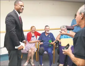  ?? Ben Lambert / Hearst Connecticu­t Media / ?? Longtime Hamden resident Peter G. Curtis was presented with a Connecticu­t Veterans Wartime Service Medal by state Sen. George Logan on Thursday. Pictured from left, Logan, Curtis’ sister Sharon Curtis Radke, and Curtis himself.