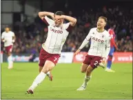  ?? Clive Rose / Getty Images ?? Aston Villa’s John McGinn, left, celebrates after scoring against Crystal Palace on Saturday.