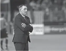  ?? MICHAEL RINCON/PHXRISINGF­C.COM ?? Phoenix Rising FC coach Rick Schantz looks on during a game against the Portland Timbers 2 on June 29 at Casino Arizona Field.