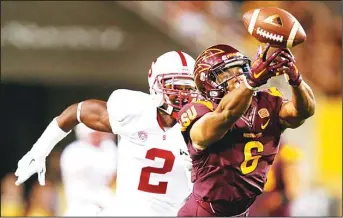  ??  ?? Wide receiver Cameron Smith #6 of the Arizona State Sun Devils is unable to catch a pass ahead of cornerback Wayne Lyons #2 of the Stanford Cardinal during the college football game at Sun Devil Stadium on Oct 18 in Tempe, Arizona.
The Sun Devils...