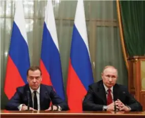  ?? FOTO EPA-EFE ?? Medvedev en Poeting kondigen het ontslag van de Russische regering aan.