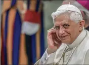  ?? DOMENICO STINELLIS — THE ASSOCIATED PRESS FILE ?? Pope Benedict XVI attends his weekly general audience in the Paul VI Hall at the Vatican on Aug. 24, 2005.