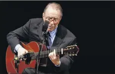  ?? Mary Altaffer / Associated Press ?? Brazilian composer Joao Gilberto, seen performing at Carnegie Hall in 2004, who is considered one of the fathers of the bossa nova genre, has died at the age of 88.