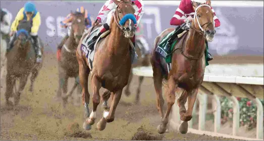  ?? JUSTIN N. LANE ?? Gun Runner (right) battles Collected into the stretch in the Breeders’ Cup Classic. The two meet again in the Pegasus.