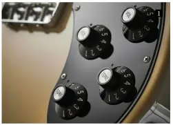  ??  ?? 1. This new version retains the original 70s-era circuit with 1meg-ohm pots and, of course, its more Gibson-style control layout with individual volume and tone controls for each pickup and a shoulderpl­aced three-way toggle pickup selector