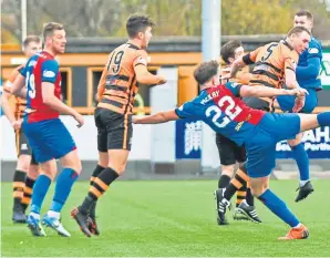  ??  ?? Off target: Daniel Mackay of Inverness Caledonian Thistle volleys a shot wide