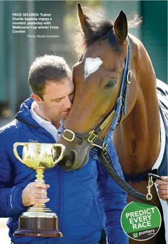  ?? Photo: Nicole Garmston ?? PRIZE SECURED: Trainer Charlie Appleby enjoys a moment yesterday with Melbourne Cup winner Cross Counter.