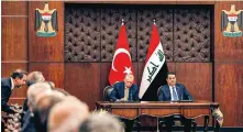  ?? ?? Iraqi Prime Minister Mohammed Shia’ Al Sudani (right) and Turkish President Recep Tayyip Erdogan attend a meeting to sign mutual agreements in Baghdad, on April 22.