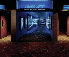  ?? MALCO ?? A space-age-looking hallway leads to Malco’s new Colliervil­le MXT auditorium.