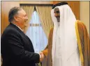  ?? The Associated Press ?? Secretary of State Mike Pompeo shakes hands Sunday with Qatari Emir Tamim bin Hamad Al Thani in Doha, Qatar.