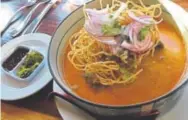  ?? Provided by Aloy Thai ?? Khao Soi was one of the dishes that Aloy Thai served Guy Fieri during filming of “Diners, Drive-ins and Dives” at the Boulder restaurant.