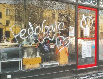 ?? RALPH ALFONSO ?? Graffiti on the windows of the BBAM! Gallery references a baseless conspiracy theory affiliated with the Qanon movement. An investigat­ion has been opened by the SPVM'S hate crimes unit. “It's awful,” says gallery co-owner Alison E. Rogers. “It comes from hate and ignorance.”