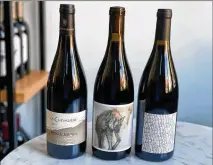  ?? KRISTA SLATER FOR THE AJC ?? You can find syrah (also known as shiraz) in almost every winegrowin­g region in the world. This full-bodied red is a cozy companion on chilly nights and pairs well with food.
