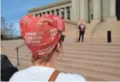  ?? ?? Members of the Oklahoma chapter of Moms Demand Action rally Monday on the south plaza of the Capitol.