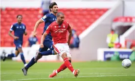  ??  ?? Lewis Grabban scores his and Nottingham Forests’s second against Huddersfie­ld. Photograph: Laurence Griffiths/Getty Images
