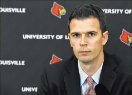  ?? Timothy D. Easley ?? The Associated Press David Padgett addresses the media after being named Louisville’s interim men’s basketball coach Friday in Louisville, Ky.