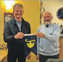  ?? ?? Hamish Loudon, right, presents the Commodore’s burgee to Vince Dean.