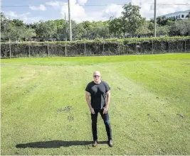  ?? PEDRO PORTAL pportal@miamiheral­d.com ?? Jim Ferguson, president of the Costa del Sol Home Associatio­n, stands on the Costa Del Sol Golf Club turf next to the property line that would be altered, if developer Edward Abbo of the Apollo Companies builds the Oasis Doral residentia­l and commercial project at the intersecti­on of Doral Boulevard and Northwest 97th Avenue. It would back up to a pair of longstandi­ng developmen­ts of modest two-story townhomes Villas of Amberwood surroundin­g Costa del Sol Golf Club.