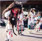  ?? COURTESY OF SWAIA ?? Along with the art, the Santa Fe Indian Market offers dances, entertainm­ent and food for visitors.