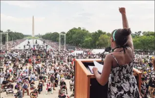  ?? Jonathan Ernst / Associated Press ?? Yolanda Renee King, granddaugh­ter of the Rev. Martin Luther King Jr., raises her fist as she speaks during the March on Washington on Friday on the 57th anniversar­y of the Rev. Martin Luther King Jr.’s “I Have A Dream” speech.