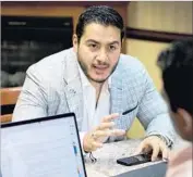  ??  ?? ABDUL EL-SAYED goes over part of his speech with communicat­ions director Adam Joseph, right, late last month at a hotel in Kalamazoo, Mich.