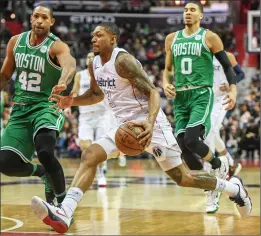  ?? Washington Post file photo ?? When they’re not playing, NBA players like Bradley Beal (center) and Jayson Tatum (right) are focused on their Twitter and Instagram accounts.