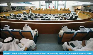  ?? ?? KUWAIT: Kuwait’s members of parliament attend a parliament­ary session at the National Assembly in Ku^HP[ *P[` PU [OPZ ÄSL WOV[V 7OV[V I` @HZZLY (S AH``H[