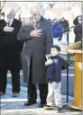  ?? Arnold Gold / Hearst Conn. Media ?? Lou Esposito, executive assistant to West Haven Mayor Nancy Rossi, holds the microphone for 5-year-old Matthew McCann as he recites the Pledge of Allegiance.