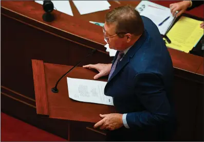  ?? (Arkansas Democrat-Gazette/Stephen Swofford) ?? State Sen. Bryan King, R-Green Forrest, answers a question from the well of the Senate at the state Capitol on Thursday, the second day of the Legislatur­e’s fiscal session.