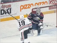 ?? BOB TYMCZYSZYN THE ST. CATHARINES STANDARD ?? Niagara’s Jason Robertson (19) scores on Saginaw goaltender Ivan Prosvetov on Thursday night Ontario Hockey League action..