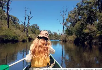  ??  ?? Kayaking down the Margaret River. Picture / Tourism Western Australia.