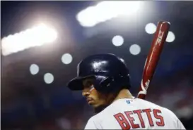  ?? PATRICK SEMANSKY — THE ASSOCIATED PRESS ?? Red Sox outfielder Mookie Betts looks across the field during the first inning of the All-Star Game on July 17 in Washington.